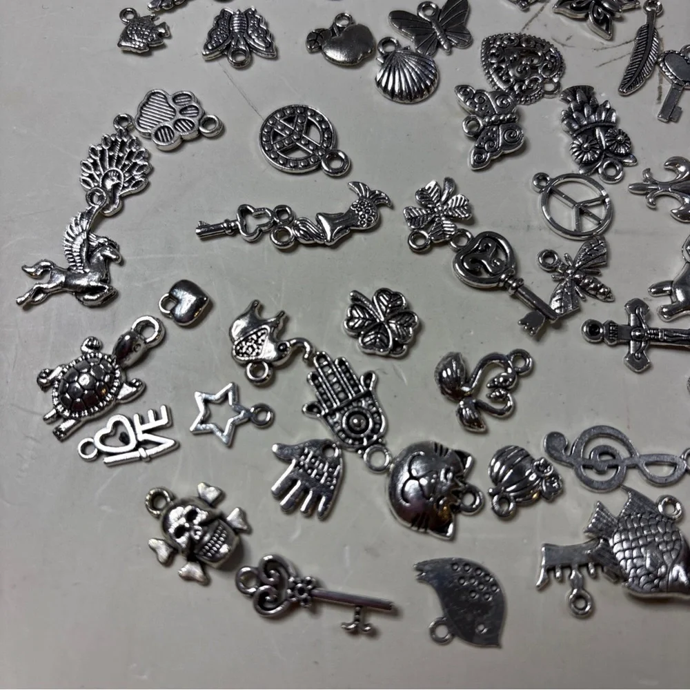 VTG 102 Silver Tone Mixed Charm Lot for Making Jewelry